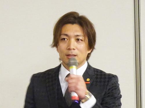 講演する糟谷耕一社長